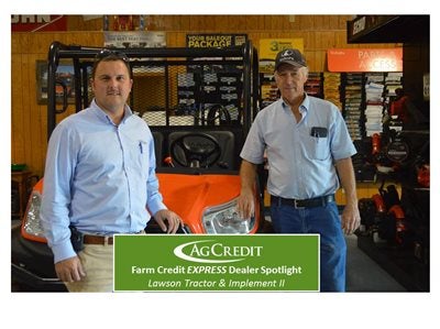 Tom Zack Evans (Ag Credit) with Ron Spalding (Lawson Tractor & Implement II)